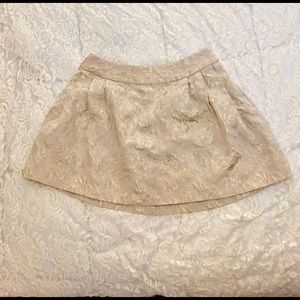 Cream and gold mini skirt